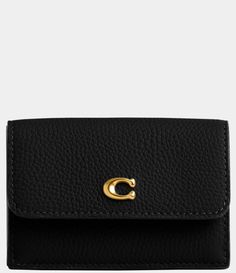 From COACH&#x2C; the Mini Trifold Wallet features:Polished pebble leatherGold-tone hardwareSix credit card slotsFull-length bill compartmentSnap closureOutside snap coin pocketApprox. 4.25" (L) x 2.75" (H) x 1" (W)Imported. Affordable Black Coin Purse With Card Slots, Cheap Elegant Wallet For Everyday Use, Affordable Classic Wallets For Formal Occasions, Black Michael Kors Wallet, Classic Coach Leather Coin Purse, Coach Black Bifold Card Holder, Classic Coach Trifold Wallet With Card Slots, Coach Leather Trifold Wallet With Card Slots, Coach Black Leather Card Holder