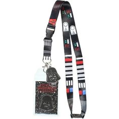 Disney Star Wars is back!  This double-sided lanyard features Darth Vader.  It has a classic lobster clasp to hold your badges, ID's or even to hook your keychain as a key lanyard. A plastic clasp 3 inches up allows for quick disconnecting and it also features a breakaway clasp at the neck.  Attached is a 1.5" rubber Darth Vader helmet pendant. Themed Black Badge Holders For Gift, Black Lanyard With Key Leash For Personal Use, Black Badge Holders With Id Window As Gift, Lanyard Badge Holder, Vader Helmet, Darth Vader Helmet, Id Lanyard, Key Lanyard, Star Wars Darth