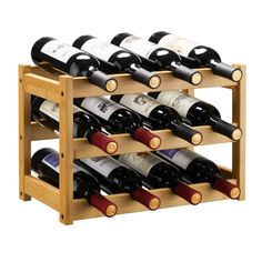 a wooden wine rack filled with lots of bottles