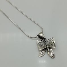 ▪︎ A sterling silver butterfly pendant with movable lower wings. ▪︎ Size: 18mm x 20 mm . Weighs: 3.8 gm ▪︎ This multi purpose pendant can be used as a charm in necklaces, bracelets, key chains, zip pullers etc. ▪︎ This pendant is handmade with hypoallergenic sterling silver. Most of my pieces are marked with a 925 silver stamp. ▪︎ Please note: This listing is for ONE pendant and comes WITHOUT the chain, however, you can add a snake chain in the required length while making your selection. You ca Yin Yang Bracelet, Wanderlust Jewelry, Silver Wings, Charm Necklace Silver, Butterfly Charm, Butterfly Pendant, Silver Pendant Necklace, Snake Chain, Boho Necklace