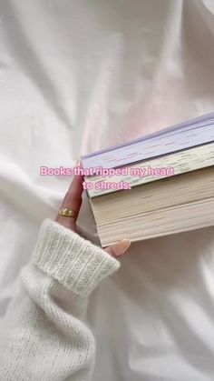 a person holding a book in their hand with the caption books that helped my heart to change