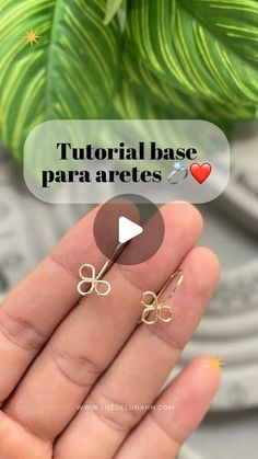 the video is showing how to make these tiny bow earrings