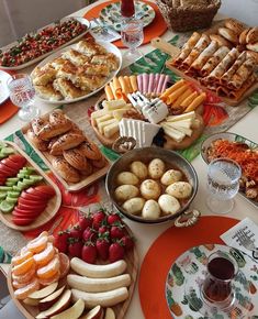 a table filled with lots of different types of food