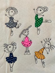 four children's hand embroidered t - shirts with different designs and colors on them