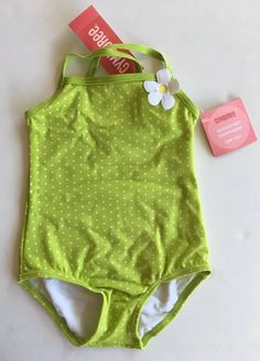 Here is a cute one-piece swimsuit from the Gymboree 2008 Swimwear line (the one that came out with the Spring Rainbow line). New with tags. Size 12-18 Months. Swimwear Polka Dot One-Piece Swimsuit - 80% nylon / 20% spandex swimsuit is fully lined in 100% nylon and has an all over print of white polka dots against a green background, a white applique flower corsage at the top, and UPF 50+ sun protection.  Color:  Granny Smith.  International Buyers - Please Note:  Import duties, taxes and charges Daisy Swimsuit, Spring Rainbow, Polka Dot One Piece, Cute One Piece Swimsuits, Applique Flower, Flower Corsage, Green Dot, Granny Smith, Apple Green