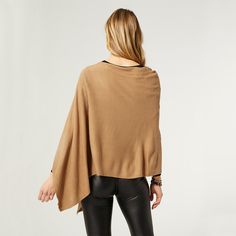 Our Lightweight Poncho is the perfect addition to any wardrobe. It’s made of soft, lightweight fabric perfect for layering. It can be worn year-round and is a must-have for work, travel, or on-the-go. This versatile poncho can be worn multiple ways including a scarf, poncho, cape and more. Pair with our Embrace Fashion Fasteners to create a unique look. Features: Color: Taupe Multiple ways to wear Perfect for layering Wear all year round Sizing: One Size Fits Most: Best fits US woman’s sizes 0-1 Winter Layering Poncho, Solid Color Winter Poncho For Layering, Solid Poncho For Winter Layering, Oversized Solid Poncho For Layering, Versatile Fall Poncho, Chic Outerwear With Batwing Sleeves For Layering, Casual Cape Poncho For Layering, Casual Layering Cape Poncho, One Size Cape Outerwear For Layering