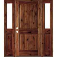 The Rustic Knotty Alder Square-Top V-Groove Prehung Exterior Door from Krosswood Doors calls to mind simpler times when homes were built for function and longevity while displaying the natural beauty of exposed wood. This eye-catching door is the perfect. Color: Red Chestnut Stain. Craftsman Front Door, Rustic Entry Doors, Gray Stained Wood, Prehung Exterior Door, Chestnut Stain, Wood Front Entry Doors, Red Mahogany Stain, Provincial Stain, Stain Wood