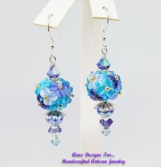 Floral Lampwork Ball Shaped Earrings in Shades of Blue, Violet and Aqua Pierced Czech Glass Dangle Earrings, Purple Czech Glass Dangle Earrings, Purple Dangle Earrings With Czech Glass, Pierced Czech Glass Drop Earrings, Purple Czech Glass Earrings With Dangling Beads, Purple Czech Glass Drop Earrings, Purple Glass Dangle Earrings, Glass Dangle Earrings For Pierced Ears, Work Earrings