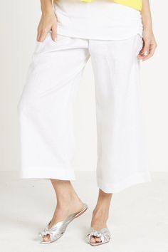 Linen Pant - pull on elastic waist, flood length pant. Lower right leg on the theigh there is a patched pocket for a cell phone,  wide leg. Versatile Wide Leg Trousers With Pull-on Style, Relaxed Fit Wide Leg Pants With Pull-on Style, Wide Leg Bottoms With Elastic Side Panels For Work, Spring Pants With Elastic Side Panels And Relaxed Fit, Versatile Straight-leg Bottoms With Elastic Side Panels, Relaxed Fit Wide Leg Pull-on Bottoms, Spring Wide-leg Pants With Elastic Side Panels, Relaxed Fit Pull-on Pants, Linen Wide-leg Pants With Patch Pockets