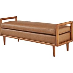 a brown leather bench sitting on top of a wooden frame