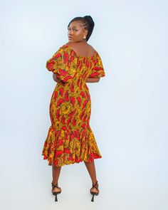 Make a statement with our Ankara Midi Gown! Stand out in bold and vibrant colors that will turn heads. Made with high-quality Ankara fabric, this gown is both stylish and comfortable. Vibrant Fitted Dress With Short Sleeves, Fitted Dress With Vibrant Print, Fitted Vibrant Print Long Dress, Fitted Long Dress With Vibrant Print, Fitted Maxi Dress With Vibrant Print And Short Sleeves, Fitted Vibrant Midi Dress With Vibrant Print, Vibrant Print Fitted Long Dress, Vibrant Fitted Maxi Dress, Vibrant Fitted Midi Dress With Vibrant Print