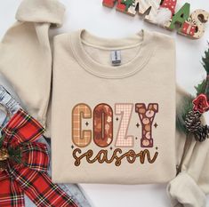 Cozy Season Halloween Shirt, Fall  spooky vibe  Shirt , Halloween Shirt , Autumn Tee, Family Shirt, Flower Cozy Shirt, Harvest Season Shirt 🛍️ **HOW TO ORDER**   📄 Pick your size and color from the drop-down menus   📸 Review the sizing and color options in the listing photos   🛒 Add the item to your cart and complete the checkout process   🚀 We'll start working on your order right away!   ✏️ **SIZING**   📊 Please review the listing photos to see the size charts   🖼️ These photos will also Hard Candy Christmas, Country Christmas Shirts, Dolly Parton Shirt, Holly Dolly, Candy Christmas, Western Girl, Santa Shirts, Girl Christmas, Fall Tee