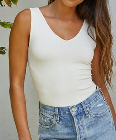 Whoever said basic is boring hasn't tried these tanks! This wide strap tank will go miles in your closet! Pair with a cardigan or jacket, or wear alone or as an activewear top. The stretchy fabric will contour your body in all the right places. 92% Nylon, 8% Spandex Wear it as a v-neck or scoop neck Colors may vary from different viewing devices Leopard Sneakers, Double Braid, Polka Dot Sweater, Star Sweater, Cute Fit, Studded Sandals, Striped Rompers, Cute Sweatshirts, Graphic Crewneck