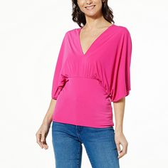 IMAN Global Chic Drape Knit Dolman Sleeve Top  Feminine, flattering and oh-so-fabulous, this draped knit top elevates your look and confidence all at the same time. Sparkle Blouse, Fabric Drape, Dolman Sleeve Top, Asymmetrical Hem Top, Fashion For Petite Women, Pink Hibiscus, Drape Sleeves, Poncho Tops, Chic Blouses