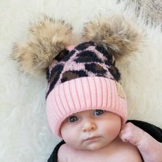 Your new CC Double Pom Baby Leopard Beanie is crafted with superior C.C.  quality for maximum comfort and warmth. Featuring two fluffy poms and a classic leopard print, this snug-fitting beanie is sure to keep your little one cozy. To ensure optimal fluffiness, use a hair dryer on cold air and a small tooth comb to brush the quality pom. Size: One Size.  Color: Pink.  Gender: unisex.  Age Group: infant. Leopard Beanie, Pink Newborn, Baby Leopard, Scarf Hat, Cold Air, Baby Beanie, Hair Dryer, Cloth Bags, Little One