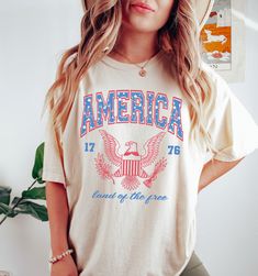 USA Shirt, Land of The Free T-Shirt, Comfort Colors®, America Flagshirt, Red White and Blue, Fourth of July, Patriotic Giftful, Merica Tee Our Unisex t-shirts are premium quality, SUPER soft and breathable, heavyweight, and 100% ring-spun cotton. We use Comfort Colors for our t-shirts and our customers love everything about them! FABRICATION: Unisex Garment-Dyed T-shirt Comfort Colors® 1717 * 100% ring-spun cotton * Heavyweight fabric (6.1 oz/yd² (206.8 g/m²) * Relaxed fit * Runs true to size SI Fourth Of July Shirts, Cowgirl Shirts, Free Tshirt, Country Shirts, Usa Shirt, Summer Bbq, Cow Girl, Trendy Shirts, Look Plus