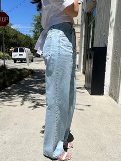 DESCRIPTION This baggy jean is featured in a high-rise with straight-out silhouette. DETAILS Zip fly and button closure, Belt loop at waist FIT & SIZEING 25" waist 35" hip 28 1/2" inseam based on size SModel is 5'2" waist (25"-26") is wearing a size S PRODUCT INFO & CARE Size: S,M Color: Denim ● Fabric: 100% cotton● Machine wash cold gentle cycle. Do not bleach High Rise Cargo Jeans For Everyday Spring Wear, Spring High Rise Mom Jeans, Medium Wash Cargo Jeans For Everyday In Spring, Everyday Medium Wash Cargo Jeans For Spring, Everyday High Rise Cargo Jeans For Spring, Everyday Spring High Rise Cargo Jeans, Everyday Spring Cargo Jeans With Tapered Leg, High Rise Mom Fit Denim Blue Bottoms, Spring Denim Cargo Jeans For Everyday