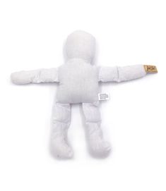 a white stuffed animal with one leg spread out