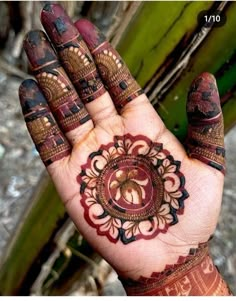 a hand that has some henna on it