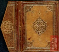 an old book with intricate designs on it