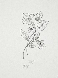 a drawing of some flowers on a white paper with the word love written in it