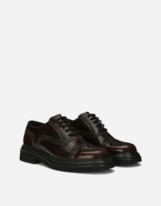 Find DOLCE & GABBANA Brushed Calfskin Oxfords on Editorialist. Brushed calfskin Oxfords with brogue detailing: Brown Waxed laces Calfskin insole with branded label Branded rubber sole Item comes with a branded dust bag Made in Italy Calf Leather Cap Toe Shoes For Fall, Fall Season Calf Leather Cap Toe Shoes, Luxury Leather-sole Oxfords For Fall, Luxury Leather Oxfords For Fall, Luxury Leather Shoes With Leather Sole For Fall, Leather Shoes With Brogue Detailing For Fall Galas, Oxford Shoes Brown, Brown Oxfords, Leather Oxford Shoes