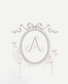 the letter a is surrounded by flowers and butterflies on a white paper with silver foil