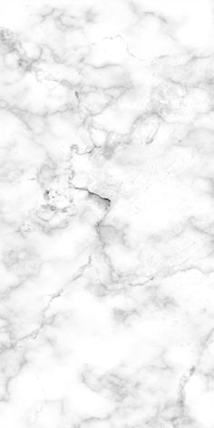 a white marble textured surface with black and red accents on the edges, as seen from above