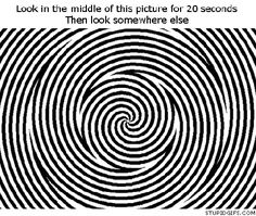 a black and white spiral design with the words look in the middle of this picture for 20 seconds