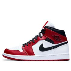 Dressed in the "Chicago" color scheme, this iteration of the Nike Air Jordan 1 Mid features the signature color-blocking of white, black and Gym Red. On the white leather upper are red overlays and black detailing, with an unconventional white heel. Sporty White Sneakers With Contrast Color, White Sporty Sneakers With Contrast Color, Leather Color Block Sneakers For Streetwear, Red Retro Leather Sneakers, White Casual Sneakers With Contrast Color, Casual White Sneakers With Contrast Color, Sporty Red Color Block Sneakers, Red Color Block Sporty Sneakers, Retro White Color Block Sneakers