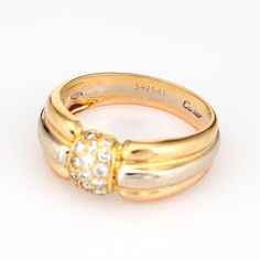 Vintage Cartier diamond ring crafted in 18 karat yellow, rose & white gold (circa 1980s to 1990s).    17 round brilliant cut diamonds total an estimated 0.34 carats (estimated at G-H colour and VS1-2 clarity).  The out of production Cartier ring features a tri-coloured band with diamonds set to the centre of a low dome mount.  The ring is great worn alone or layered with your fine jewellery from any era.  The ring is in very good condition. No box or papers.  Particulars:  Weight: 5.3 grammes  S Cartier Diamond Ring, Cartier Diamond Rings, Wedding Ring Guard, Band With Diamonds, Cartier Diamond, Ring Guard, Platinum Wedding Band, Cartier Jewelry, Cartier Ring