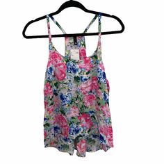 Perfect For Spring/Summer. Flowy Skinny Strap Tank. Pretty Floral Print. Size 8. 100% Viscose. Printed Summer Tank Top For Day Out, Summer Printed Tank Top For Day Out, Fitted Floral Print Tank Top For Beach Season, Summer Beach Printed Tank Top, Trendy Floral Print Tank Top For Vacation, Printed Tank Top For Spring And Summer, Multicolor Floral Print Tank Top For Vacation, Spring Tropical Print Sleeveless Tank Top, Summer Floral Print Tank Top For Vacation