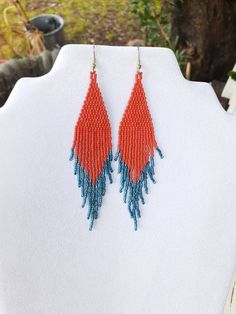 These Native Beaded Coral & Turquoise Earrings are custom made it Coral & Silver lined Turquoise They are about 3 inch long with Silver wires on them, can be changed to post or clips. It you have any Questions just ask. Thanks for looking. Artisan Jewelry With Beaded Fringe For Crafting, Southwestern Handwoven Turquoise Jewelry, Southwestern Handwoven Blue Jewelry, Native American Style, Earrings Bohemian, Native American Fashion, Brick Stitch, Coral Turquoise, Turquoise Earrings