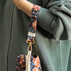 Our hands-free wristlet lanyard will keep you organized no matter where life takes you. Created using upcycled, 100% cotton canvas fabric remnants from our production studio. This is the accessory you'll wonder how you ever lived without! Constructed with a durable gold lobster clasp. 8" total length x 1" wideTravel Pouch Not Included Proudly made by hand in our Austin, TX studio. More styles available from this collection. Multicolor Everyday Wristlet With Key Leash, Everyday Multicolor Wristlet With Key Leash, Multicolor Wristlet With Key Leash For Everyday, Everyday Wristlet With Adjustable Strap, Wristlet Lanyard, Production Studio, Cotton Canvas Fabric, Wristlet Keychain, Fabric Remnants