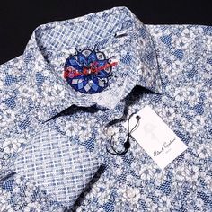 Robert Graham Geometric Floral White Blue Long Sleeve Sports Shirt Men's L Brand New With Tags Retail $198 Approximate Flat Lay Measurements Armpit-Armpit: 24" Top-Bottom: 32" Details Point Collar Button-Front Closure Long Sleeves With Button Cuffs All Over Print Machine Wash Iteam Ships Sameday Or Nextday With Tracking Information. 100% Authentic Product Please View All Photos, Description And Details. Robert Graham Shirts Men, Luxury Long Sleeve Blue Shirt, Luxury Blue Long Sleeve Shirt, Luxury Blue Cotton Shirt, Luxury Fitted Blue Shirt, Luxury Blue Shirt With Spread Collar, Designer Blue Shirt With Spread Collar, Luxury Blue Shirt, Luxury Blue Long Sleeve Tops