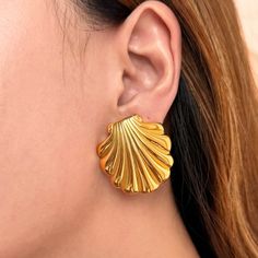 Inspired by the beauty of the ocean, these Vintage Chunky Gold Seashell Earrings are a must-have for any jewelry collection. Crafted from durable stainless steel with a bold gold finish, these statement earrings offer a unique blend of vintage charm and modern minimalism. Their seashell design makes them perfect for adding a touch of elegance to any outfit, whether you're dressing up for a special occasion or adding a little flair to your everyday look. ☑ Why Choose These Vintage Chunky Gold Sea Gold Shell-shaped Earrings For Party, Gold Retro Earrings As Gift, Retro Gold Earrings For Gift, Gold Retro Earrings For Gift, Shell-shaped Clip-on Earrings For Gift, Elegant Shell-shaped Clip-on Earrings For Gift, Elegant Shell-shaped Clip-on Earrings As Gift, Seashell Earrings, Gold Statement Earrings