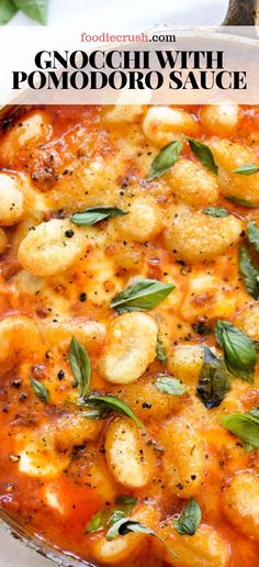 gnocchi with pomodoro sauce in a glass dish on a table