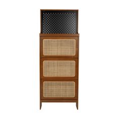 an old fashioned radio cabinet with wicker doors