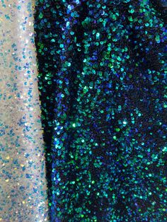 blue and green sequins on white fabric