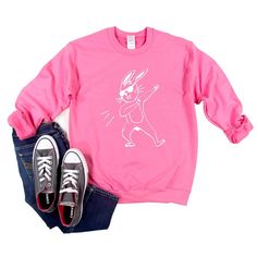 Looking for a cute sweatshirt for your kids? We have the perfect Dabbing Bunny graphic sweatshirt addition to their closet! Also available in toddler sweatshirts. Cute Crew Neck Sweatshirt For School, Relaxed Fit Cartoon Print Sweatshirt For Spring, Spring Cartoon Print Relaxed Fit Sweatshirt, Cute Sweatshirt With Funny Print And Crew Neck, Cute Crew Neck Sweatshirt With Funny Print, Spring Cotton Sweatshirt With Cartoon Print, Playful Cotton Crew Neck Sweatshirt, Playful Crew Neck Sweater With Graphic Print, Cartoon Print Long Sleeve Sweatshirt For School