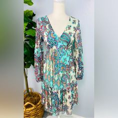 Excellent Condition! Size 6 Never Worn!!! Sleeves Are Long Sheer Cuffed Bell Sleeves Body Of Dress Is Lined Very Stretchy And Airy Paisley Print V-neck Patterned Dress, Spring Paisley Print Boho V-neck Dress, Spring V-neck Boho Dress With Paisley Print, Patterned V-neck Paisley Print Dress, V-neck Paisley Print Patterned Dresses, Patterned Paisley Print V-neck Dresses, Bohemian Blue Mini Dress With Paisley Print, Fitted Paisley Print Dress For Brunch, Spring Paisley Print Boho Dress