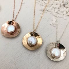 A beautiful freshwater coin pearl is safely nestled in a hand formed shining textured disc of sterling silver or 14kt gold fill. Simple, elegant, modern. Sterling silver or 14kt gold or rose gold fill for long term worry free wear. BACK TO MY SHOP: https://www.etsy.com/shop/IsabelleGraceJewelry Pyrite Jewelry, Coin Pearl Necklace, Open Cuff Ring, Necklace With Pearl, Double Chain Necklace, Silver Pearl Necklace, Sparkle Necklace, Coin Pearls, Gold Pearl Necklace