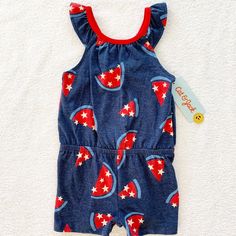 Navy Blue Sleeveless Romper With An All Over Patriotic Print. Ruffle Detail On The Sleeves. Bow Detail On The Back. Size: 12 Months. New With Tags. Playful Blue Bubble Romper For Summer, Blue Summer Bubble Romper For Playtime, Blue Casual Bubble Romper For Playdate, Casual Blue Bubble Romper For Playdate, Summer Blue Sleeveless Bubble Romper, Blue Sleeveless Summer Bubble Romper, Blue Bubble Romper For Summer Playdate, Playful Red Sleeveless Bubble Romper, Fitted Sleeveless Bubble Romper For Playdate