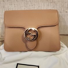 Brand New With Dust Bag. Very Versatile Color That Goes With Everything! Can Be Worn Crossbody Or As A Shoulder Bag. Designer Gucci Bags With Cc Turnlock Closure, Chic Gucci Shoulder Bag With Cc Turnlock, Chic Gucci Shoulder Bag With Cc Turnlock Closure, Gucci Beige Crossbody Bag, Designer Beige Shoulder Bag With Turn-lock Closure, Beige Gucci Bag With Turn-lock Closure, Gucci Shoulder Bag With Gold-tone Logo For Everyday Use, Gucci Beige Bags With Turn-lock Closure, Elegant Gucci Shoulder Bag With Turn-lock Closure