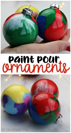 an ornament that is painted to look like christmas balls with the words paint pour ornaments