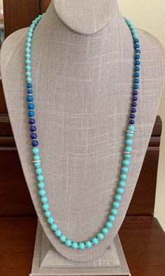 Ann Taylor Blue Bead Long Necklace, New with Original Tag. Multiple Shades of Blue Beads with Goldtone Accents, Graduated in Size. Crystal Rhinestone accents.  36 Inches Long. Beads are Graduated in size from 5-8 Millimeters. In Excellent, New Condition. With Original Tag. Cheap Turquoise Long Beaded Necklace, Affordable Turquoise Long Beaded Necklace, Long Blue Beaded Necklace, Luxury Long Blue Beaded Necklace, Luxury Blue Long Beaded Necklace, Luxury Blue Beaded Long Necklace, Elegant Blue Hand-strung Beaded Necklaces, Turquoise Long Hand-strung Beaded Necklaces, Blue Turquoise Multi-strand Necklace With Polished Beads