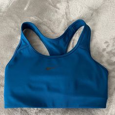 Nike Sports Bra New Without Tags. Washed But Never Worn. Size Xs. Blue Racerback Sports Bra With Built-in Padding, Blue Sportswear Activewear With Built-in Padding, Nike Stretch Sports Bra For Running, Blue Fitted Racerback Sports Bra, Functional Blue Sports Bra With Medium Support, Blue Sleeveless Sports Bra For Gym, Functional Blue Sports Bra For Gym, Blue Breathable Sports Bra For Training, Blue Sleeveless Moisture-wicking Sports Bra