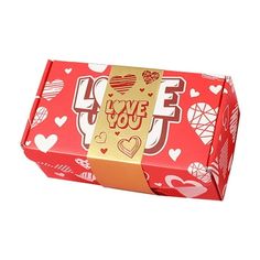 a red box with gold foil on it that says i love you and has hearts all over it