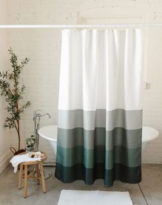 PRICES MAY VARY. LUXURY FABRIC | This thick and luxurious 230 GSM polyester waffle shower curtain drapes beautifully and is soft to the touch. The waffle weave fabric brings 5-star hotel shower curtain luxury home to your bathroom. Our green cloth shower curtain design paired with our waffle fabric adds the ultimate touch of luxury and decadence. Make your home a sanctuary with our green shower curtain for bathroom. DESIGN | A tonal green stripe print brings a modern yet timeless design aestheti Navy Blue Shower Curtain, Hotel Shower Curtain, Two Shower Curtains, Curtains For Bathroom, Beach Shower Curtains, Bathroom Stand, Cute Shower Curtains, Cloth Shower Curtain, Bathroom Luxury