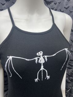 This is a Bat skeleton bodysuit. This has a bat image screen printed on the front. 95% cotton / 5% spandex These are handmade screenprinted and slightly vary from the photo. Please feel free to email me any questions. Thanks for looking. Due to an influx of incorrect addresses if a package is returned, you must pay the shipping cost to resend the item to you. The seller is not responsible for any lost or stolen packages. Gothic Bodysuit For Halloween Costume Party, Fitted Halloween Festival Bodysuit, Fitted Bodysuit For Halloween Festival, Gothic Black Bodysuit For Halloween, Black Gothic Bodysuit For Halloween, Fitted Gothic Top For Halloween, Black Fitted Punk Bodysuit, Fitted Black Punk Bodysuit, Printed Fitted Cotton Bodysuit